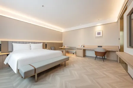 Xingcheng Hotel (Houma Jindu Commercial Plaza Hotel) Отели рядом с достопримечательностью «Kaifaqu Pedestrian Street»