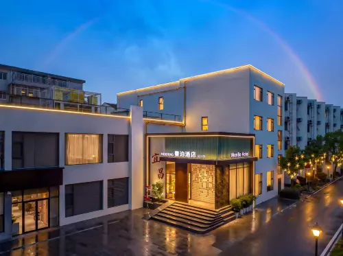 Mooring Manbo · Designer Hotel (Yichang Wuyi Square East Station) - ที่มีฟิตเนส