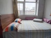 长春英海公寓 - 标准大床房（公共卫生间）（无法洗浴）