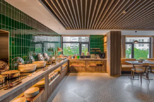 Orange Hotel (Beijing Niujie Subway Station) Отели рядом с достопримечательностью «The Buddhist Academy of China»