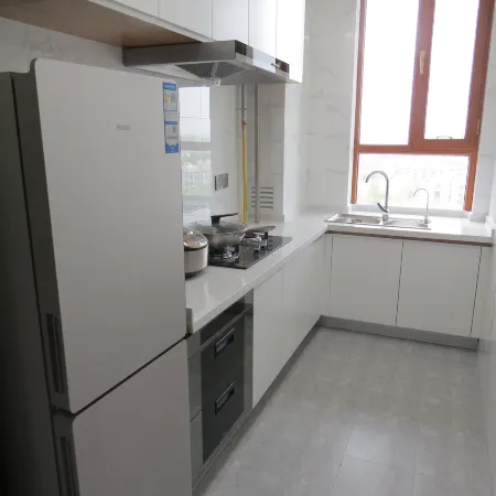 Guazhou Yuanquanhu Hotel Apartment Отели в г. Гуачжоу