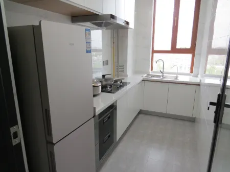 Guazhou Yuanquanhu Hotel Apartment