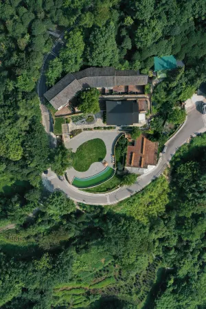 xinbo nanshan homestay Отели рядом с достопримечательностью «Nanshan Botanical Garden»