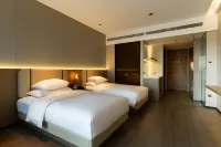 Maison New Century Hotel Lu'an