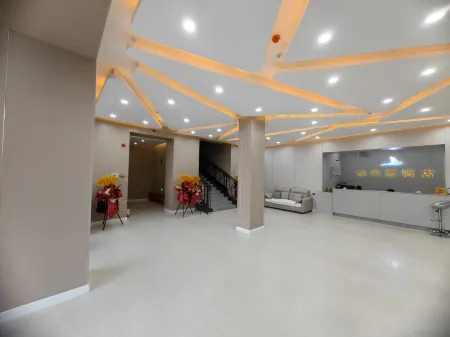 UP Huayi Hotel (Jixi Shi Railway Station Wanda Plaza) Отели рядом со станцией Jixi Railway Station