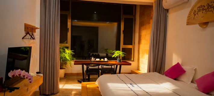 Qiyun Bieyuan Inn Hotel a Eryuan