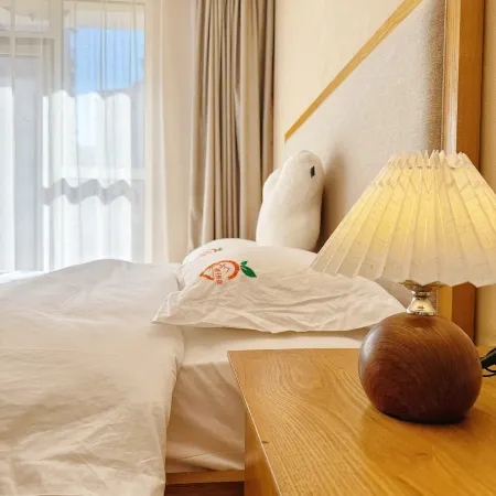 Orange Homestay (Fulong Four Seasons Town) Отели рядом с достопримечательностью «Центральная больница в районе Цуйли»