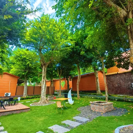 Wenchang Xiyu Garden Resort Wooden House Hotel