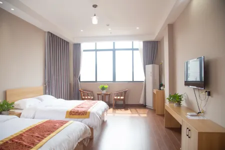 Xinganzhangwei Business Hotel Отели рядом с достопримечательностью «Zhu De Commander in Chief Mrs. Xiao Jufang Former Residence»