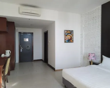 Ginasuite Kompleks27 Hotel โรงแรมในบันดาร์เซอรีเบอกาวัน
