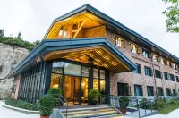 Yunmeng Shanju Guesthouse Отели рядом с достопримечательностью «Qingxin Pond»