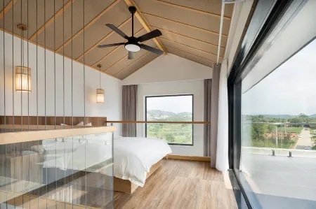 Dongmei Yueju Qiyue Yunsu Hotel Отели рядом с достопримечательностью «Qianzhang Canyon»