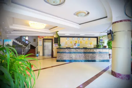 Huifeng Business Hotel (Lingyuan Yipzu) Отели в г. Линюань