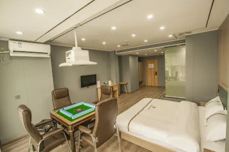 Fu Xing holiday hotel Отели рядом с достопримечательностью «Hunan University of Science and Technology Gymnasium»