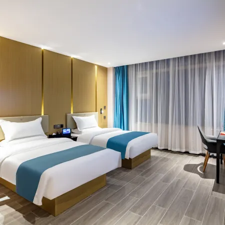 M·Qingju Hotel (Taiyuan Liuxiang Wanda Plaza) Отели рядом с достопримечательностью «Бассейн Черный Дракон»