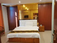 Guigang Mingshun Hotel (Huashun Automobile Maintenance Center Qingfeng No.2 Middle School Shop)