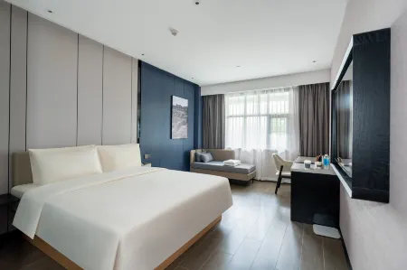 โรงแรมเอทัวร์ เอ็กซ์ สถานีรถไฟความเร็วสูงท่าเรือกงเป่ย