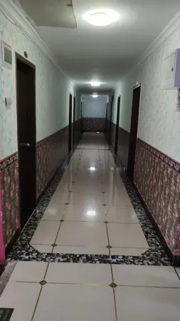 Taojiang Huasheng Hotel Отели рядом с достопримечательностью «Taohuajiang Bamboo Sea»