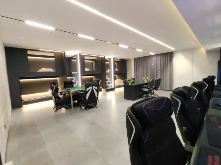 Mujin E-sports Hotel Отели рядом с достопримечательностью «Jiyuan Vocational and Technical College (Qinyuan Campus)»