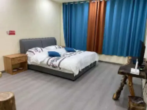 Hexiangju Homestay (Deqin Shengping Town) โรงแรมใกล้จุดชมวิวด้านบนหมอกหนา