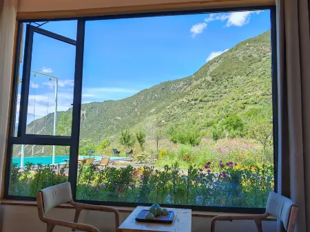 Mountain Tour Homestay（Four Sisters Mountains） Отели рядом с достопримечательностью «Shuangqiao Valley»