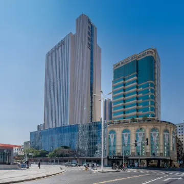 Meilun Jinyue Hotel (Xiamen Zhongshan Road Wenzao Subway Station) Отели в г. Сямэнь
