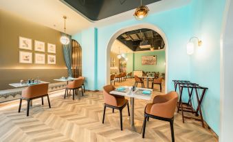 FCG  SUITES  BY  NEQTA