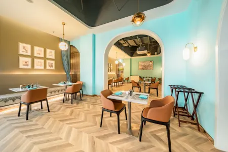 FCG  SUITES  BY  NEQTA