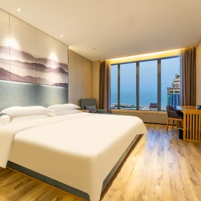 Qingdao Yilan Xinsu Hotel (Shilaoren bathing beach, International Convention and Exhibition Center) Hotels near Stone Man Bathing Beach