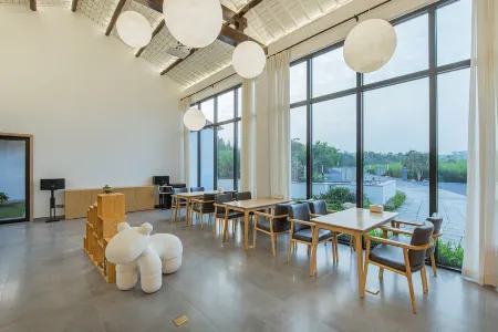 Shanli·Peninsula Waterfront Hot Spring Resort Отели рядом с достопримечательностью «guo ji zhu yi shang mao cheng»