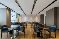 Echarm Hotel (Nanchangxizhan North Square Shengfuyou)
