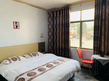 Huanjiang Sanqiao Hotel Отели рядом с достопримечательностью «Guangxi Mulun Nature Reserve»