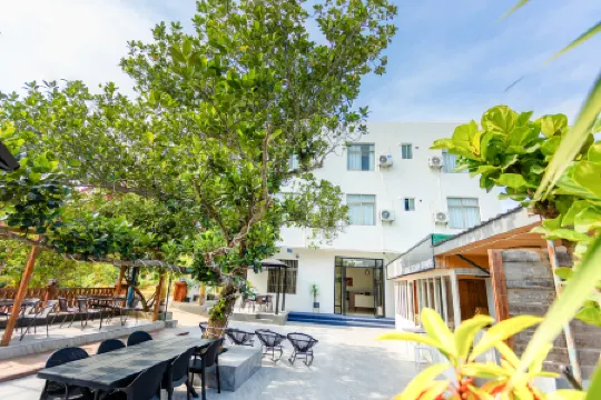 Gunai Good Night Homestay (Wucaitan Branch, Weizhou Island) Отели рядом с достопримечательностью «Great Palace»