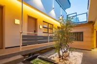 Xinzhou Huaxi Hot Spring Homestay (Xinzhou Ancient Town Branch) - 2 ดาว