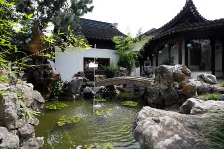 Suzhou Nuanzu Boutique Minsu Отели рядом с достопримечательностью «Ботанический сад Цзяньнан»