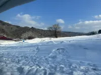 Snow Valley Ridge Mountain Dwelling Inn Отели рядом с достопримечательностью «Xuexiang Gouxiongling»