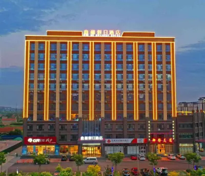 Xinhe Holiday Hotel Hotels near Qimai Mountain Park