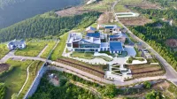 Shiyan Olive Light Homestay Отели рядом с достопримечательностью «Shiyan Radio and TV University Yunxian Branch»