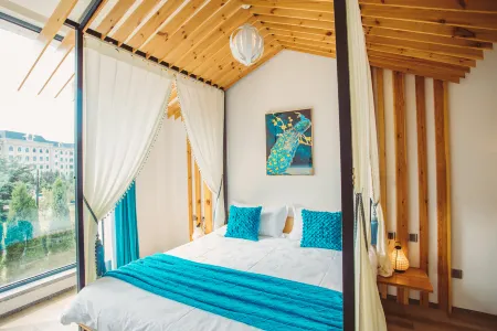 JIUJIU INN Отели рядом с достопримечательностью «Dalian University of Foreign Languages (Lvshun South Road)»