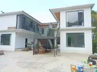 Jiani Shangu Homestay Отели рядом с достопримечательностью «Волна Большого Резака»