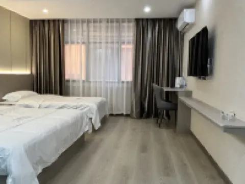 Qiqi Hotel (Longnan High-Speed Railway Station First People's Hospital) Hotels in Longnan