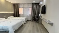 Qiqi Hotel (Longnan High-Speed Railway Station First People's Hospital)