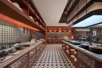 Manon Hotel Yining Border Economic Cooperation Zone Отели в г. Иньинг