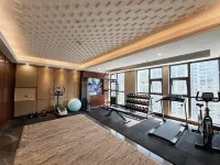 Diqiu Lvbaoshi Hotel - gimnasio