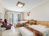 三亚金珊瑚海景度假公寓 - 椰林海景双床亲子房