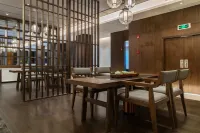 Jinding Xinxin Hotel - فطور