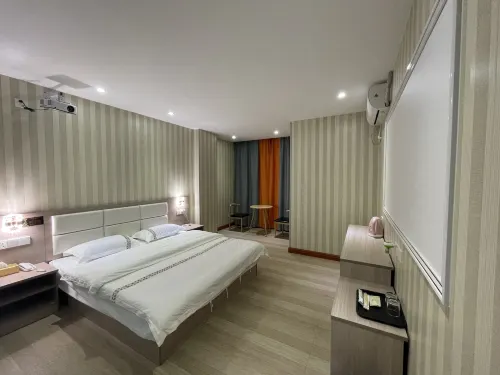 Jiangmen Yiwan Apartment with Elevator (Jiangmen East Railway Station Jianghai Square) - Inns