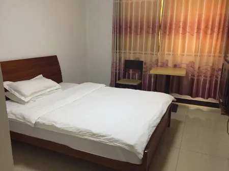 Xinhui Apartment Отели рядом с достопримечательностью «Huafushan Scenic Area»