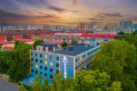 WhiteMagnoliaHotel (ShijiazhuangBethuneInternationalPeaceHospital54thInstituteLivingAreaBranch) Hotels near Shiqiao Vegetable