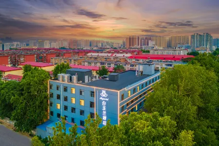 WhiteMagnoliaHotel (ShijiazhuangBethuneInternationalPeaceHospital54thInstituteLivingAreaBranch) Отели рядом с достопримечательностью «Shijiazhuang Vocational Technology Institute»